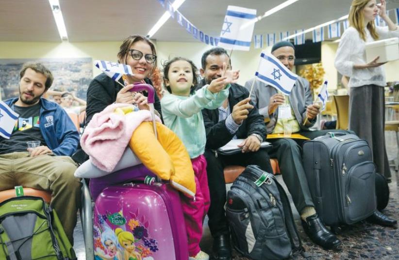 NEW IMMIGRANTS from Brazil arrive at Ben-Gurion International Airport on March 14. (photo credit: Courtesy)