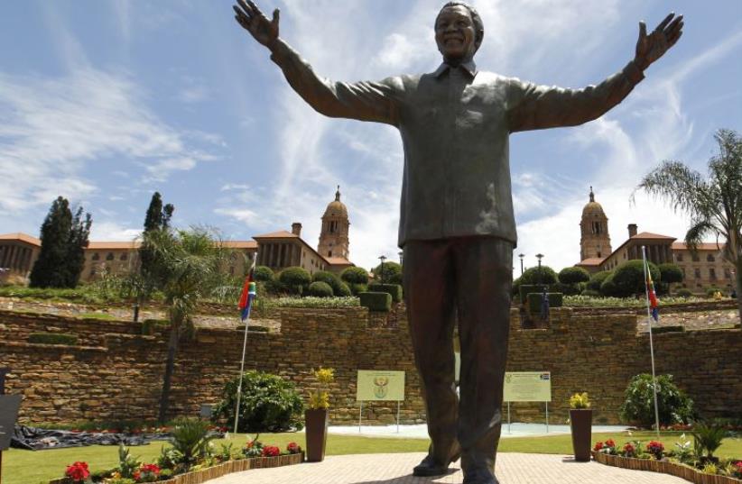 A bronze statue of the late former South African President Nelson Mandela, Pretoria (photo credit: REUTERS)
