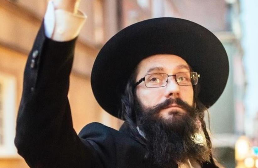 The man posing as Rabbi Jacoob Ben Nistell, from Haifa, Israel, is found to actuallky be Jacek Niszczota from Poland (photo credit: FACEBOOK)