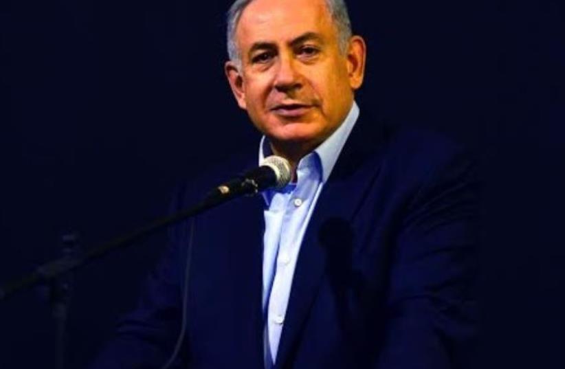 Benjamin Netanyahu speaking at a ceremony for fallen soldiers. (photo credit: KOBI GIDON / GPO)