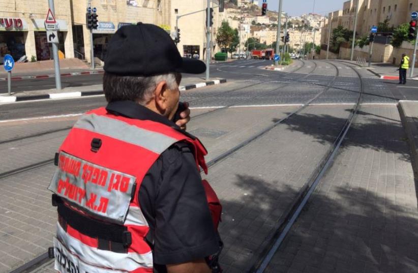 Forces on site of mysterious hazmat spill in Jerusalem. (photo credit: JERUSALEM FIRE AND RESCUE SERVICES)