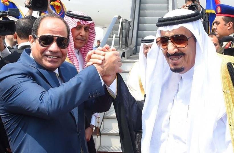 Egyptian President Abdel Fattah al-Sisi (L) and Saudi King Salman (photo credit: AFP PHOTO)