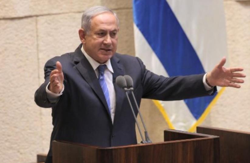 Prime Minister Benjamin Netanyahu addresses the Knesset in Jerusalem (photo credit: AFP PHOTO)