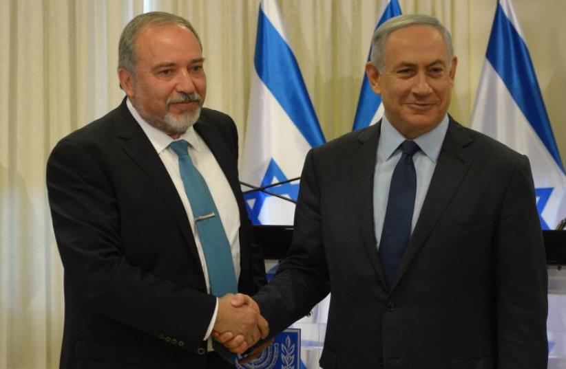 Netanyahu and Liberman (photo credit: AMOS BEN GERSHOM, GPO)