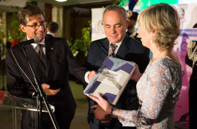 Ambassador Talo, Minister Steinitz, Minister Giannini with copy of Talmud (photo credit: ALEX PERGAMENT)