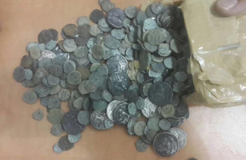 A driver for the Norwegian ebassy was arrested after attempting to steal at least 10 kilograms of ancient coins and figurines   (photo credit: CUSTOMS AUTHORITY)