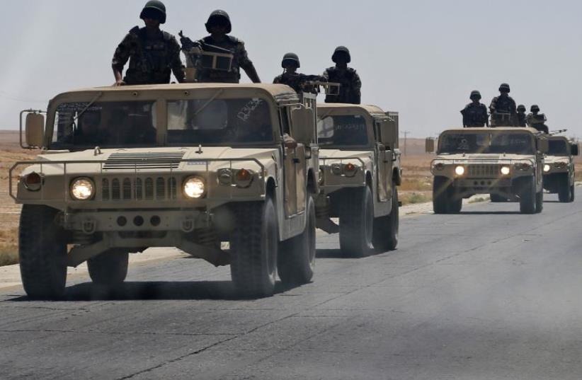 A Jordanian army convoy  (photo credit: REUTERS)