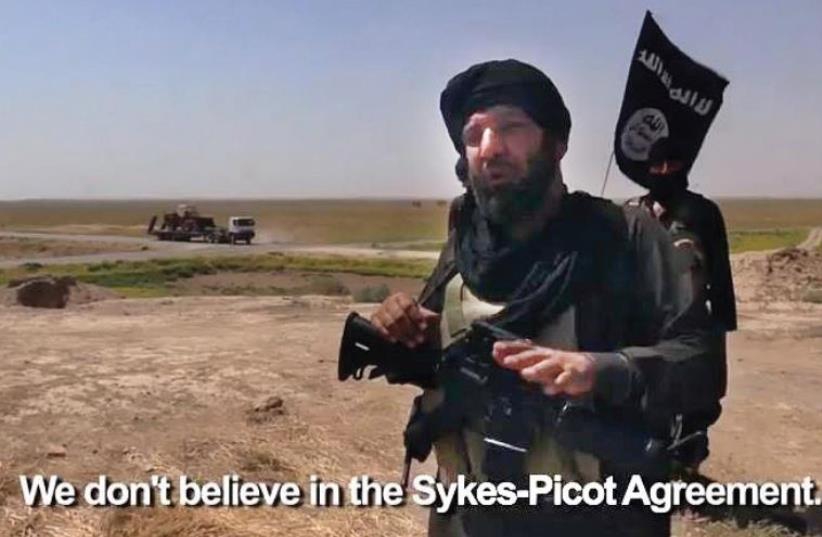 ISIS militant (photo credit: screenshot)