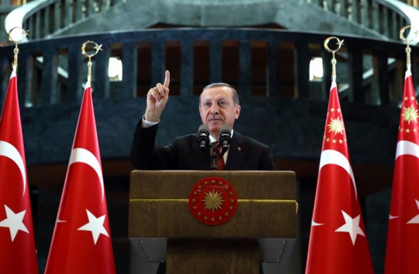 Turkish President Tayyip Erdogan makes a speech during an iftar event in Ankara, Turkey, June 27, 2016 (photo credit: REUTERS)