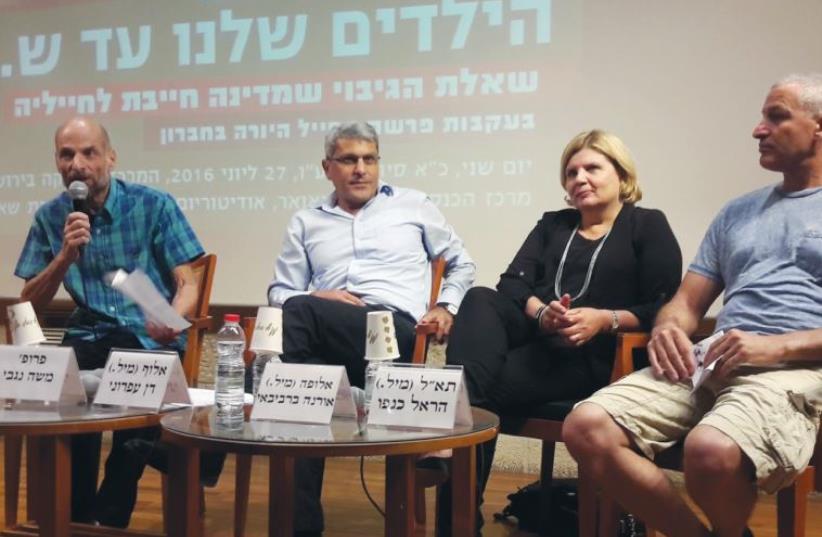 PARTICIPANTS AT THE recent Jerusalem Center for Ethics conference are (l to r) legal commentator Prof. Moshe Negbi, former military advocate-general Maj.-Gen. (res.) Danny Efroni, former maj.-gen. and head of the IDF Manpower Directorate Orna Barbibie, and former brig.-gen. and paratroopers commande (photo credit: YONAH JEREMY BOB)