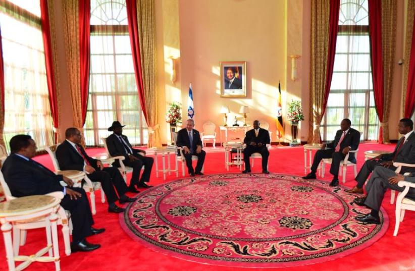 Prime Minister Benjamin Netanyahu with seven east African leaders (photo credit: KOBI GIDEON/GPO)