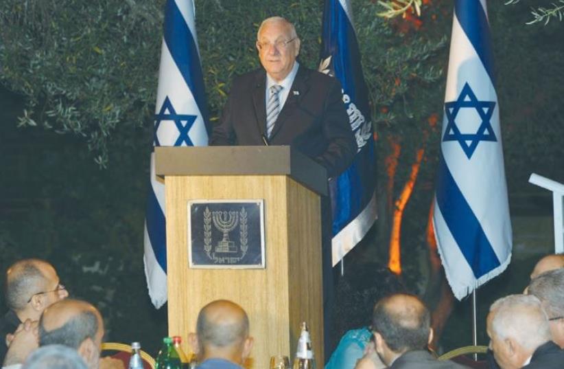 PRESIDENT REUVEN RIVLIN speaks at an Iftar meal on Sunday at the President’s Residence in Jerusalem. ( (photo credit: AMOS BEN GERSHOM, GPO)