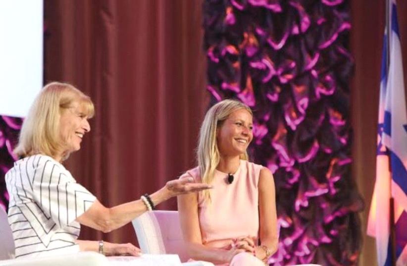 HADASSAH WOMEN’S Zionist Organization of America National President Ellen Hershkin (left) makes a presentation to award-winning actress Gwyneth Paltrow. (photo credit: Courtesy)