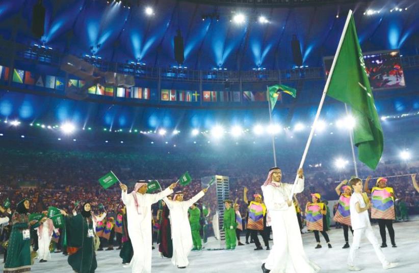 THE SAUDI ARABIAN delegation arrives at the Olympic opening ceremony in Brazil. (photo credit: REUTERS)