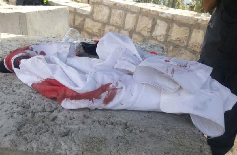 A blood-stained shirt from the scene of east Jerusalem stabbing on August 11, 2016 (photo credit: POLICE SPOKESPERSON'S UNIT)