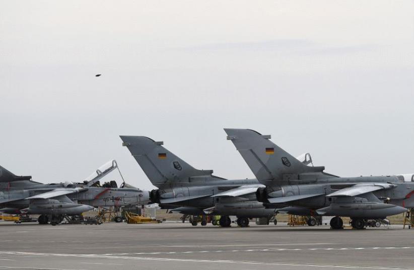 German Tornado jets are pictured on the ground at the air base in Incirlik, Turkey, January 21, 2016 (photo credit: REUTERS)