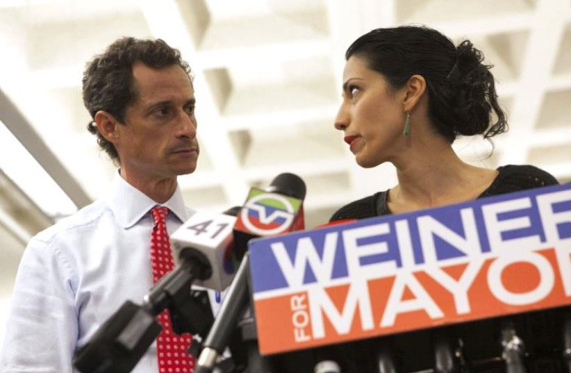 New York mayoral candidate Anthony Weiner and Huma Abedin, a top aide to Democratic presidential candidate Hillary Clinton (photo credit: REUTERS)