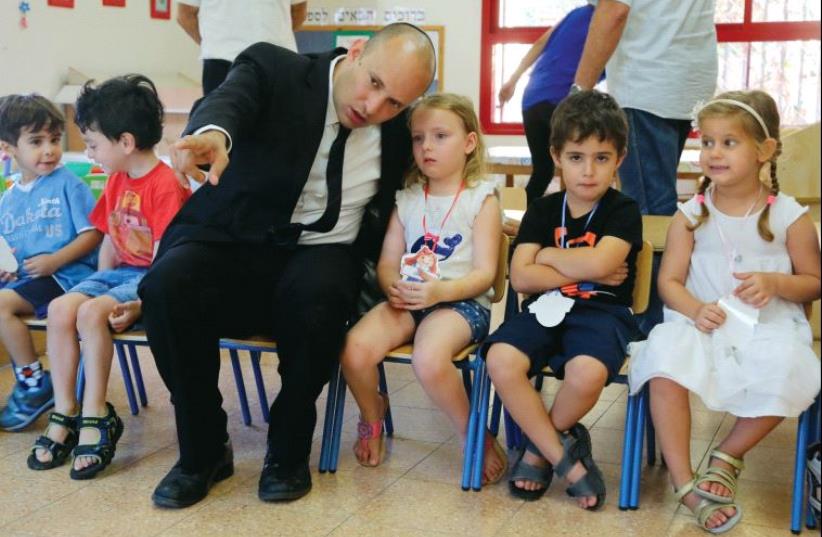 Education Minister Naftali Bennett meets with pupils at the start school year (photo credit: SASSON TIRAM)