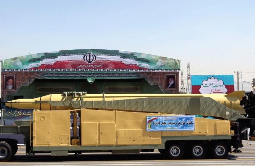 AN IRANIAN ‘peace’ missile on display during a 2015 parade overseen by Ayatollah Khamanei (photo credit: REUTERS)