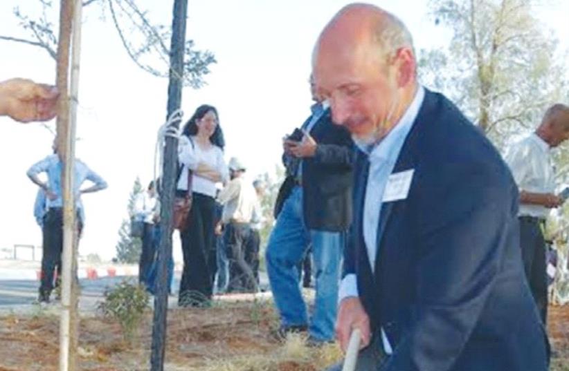 SLOVAKIAN AMBASSADOR Peter Hulenyi plants a tree in the JNF’s Yatir Forest. (photo credit: Courtesy)
