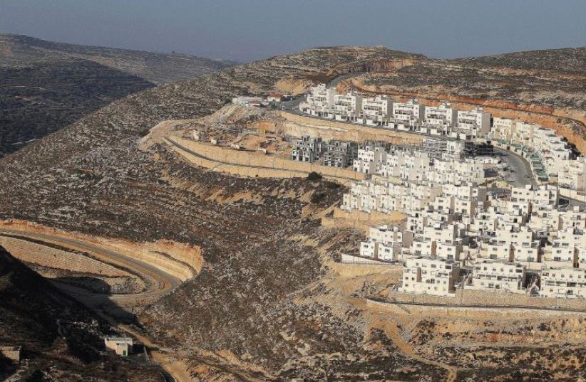 A CONSTRUCTION site in the West Bank settlement of Givat Ze’ev, near Jerusalem [File] (photo credit: REUTERS)