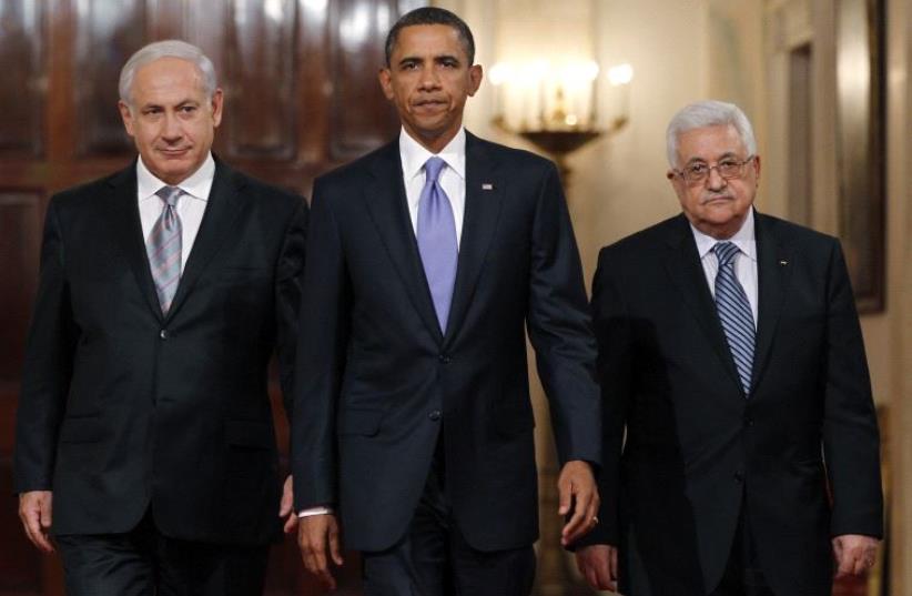 US President Barack Obama arrives with Prime Minister Benjamin Netanyahu (L) and Palestinian Authority President Mahmoud Abbas (R) in Washington September 1, 2010 (photo credit: REUTERS)