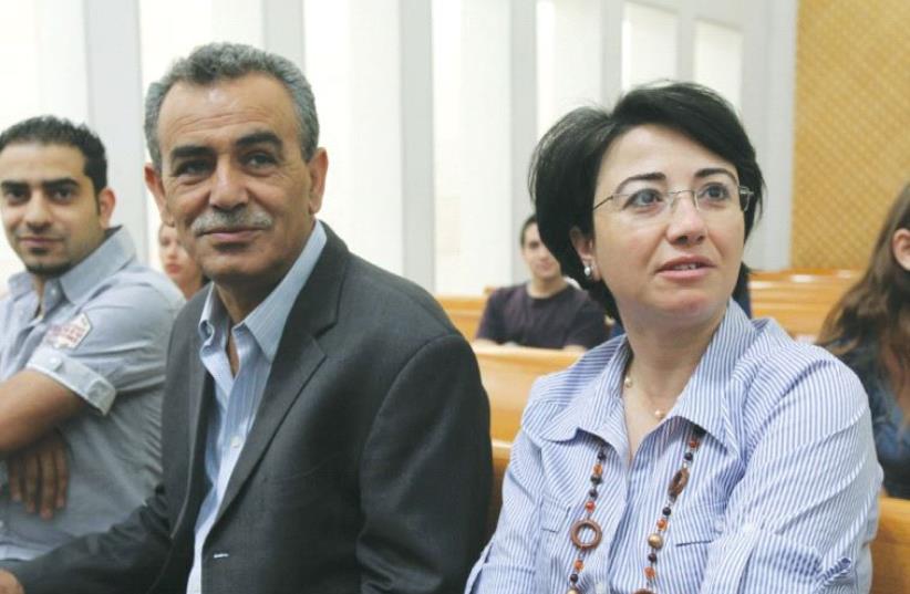 MK HANEEN ZOABI (right) sits with MK Jamal Zahalka at the Supreme Court in Jerusalem in May 2012. (photo credit: MARC ISRAEL SELLEM/THE JERUSALEM POST)