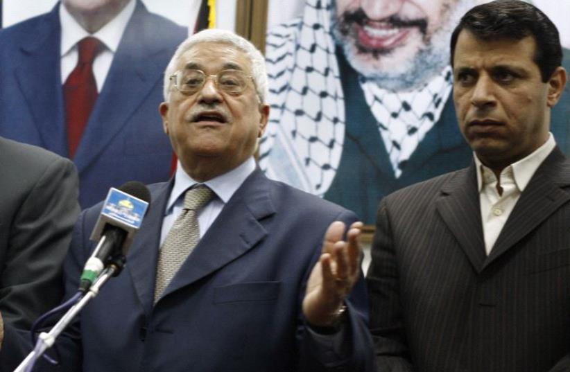 Palestinian President Mahmoud Abbas and Muhammed Dahlan (right) (photo credit: REUTERS)