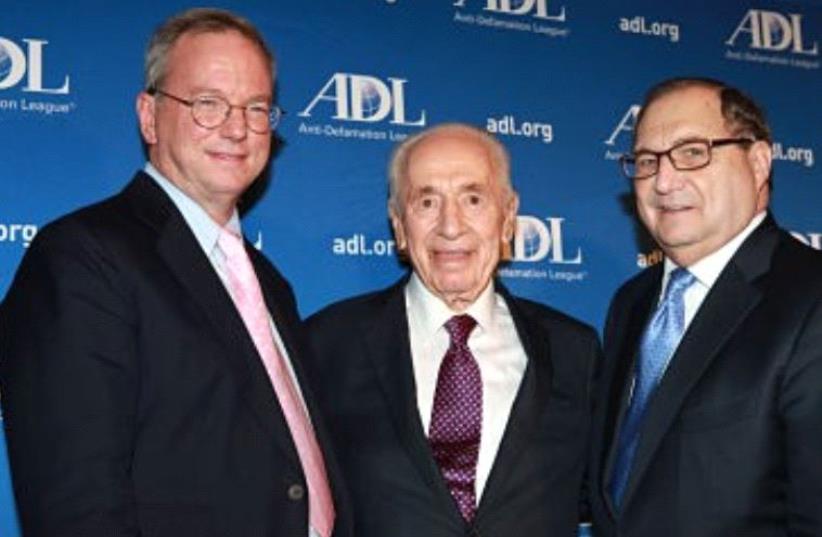 Former ADL national director Abraham H. Foxman presented two of ADL's top awards to Shimon Peres, the ninth president of the State of Israel, and Eric Schmidt, former executive chairman of Google. (photo credit: ADL)