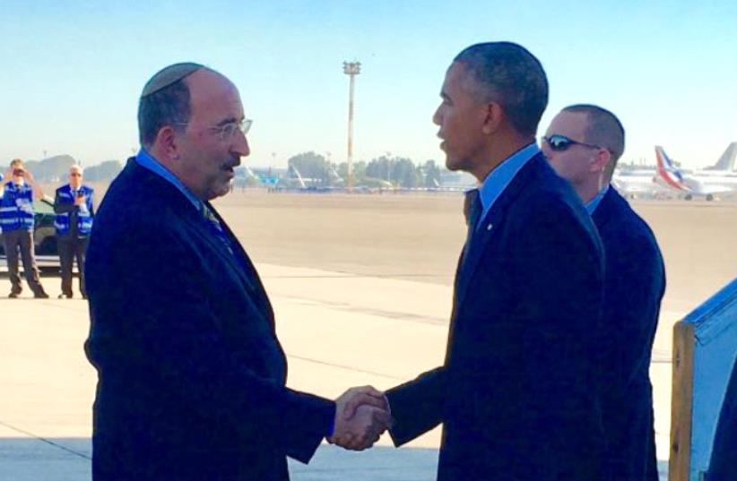 US President Barack Obama greeted by Dore Gold as he lands at Ben Gurion Airport (photo credit: FOREIGN MINISTRY)