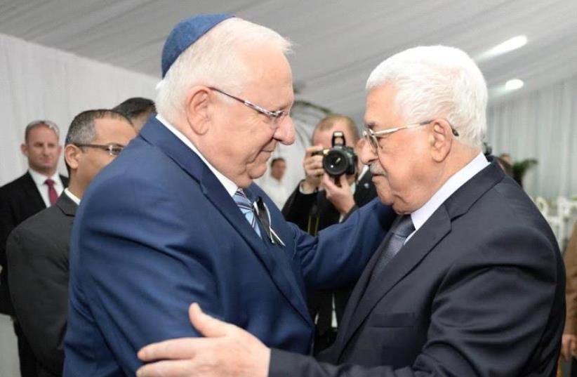 President Rivlin with PA President Abbas (photo credit: Mark Neiman/GPO)