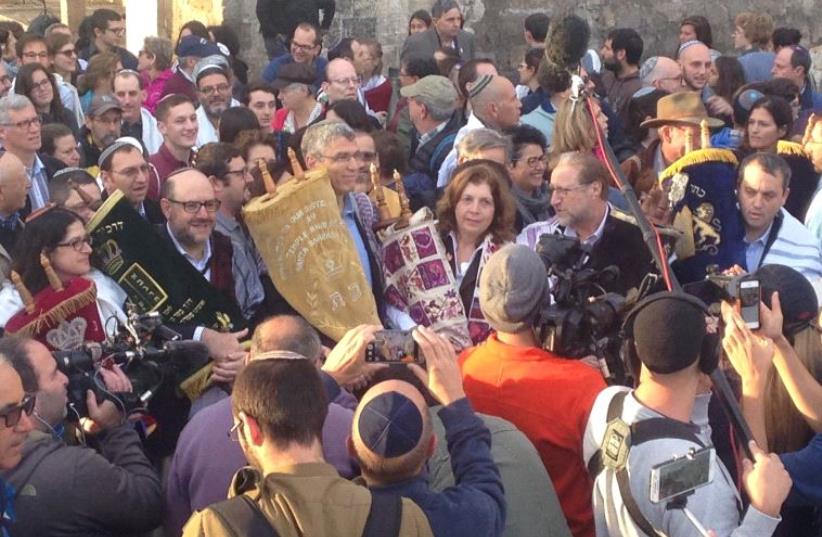 Progressive Jewish leaders begin procession with Torah scrolls to Western Wall entrance (photo credit: JEREMY SHARON)