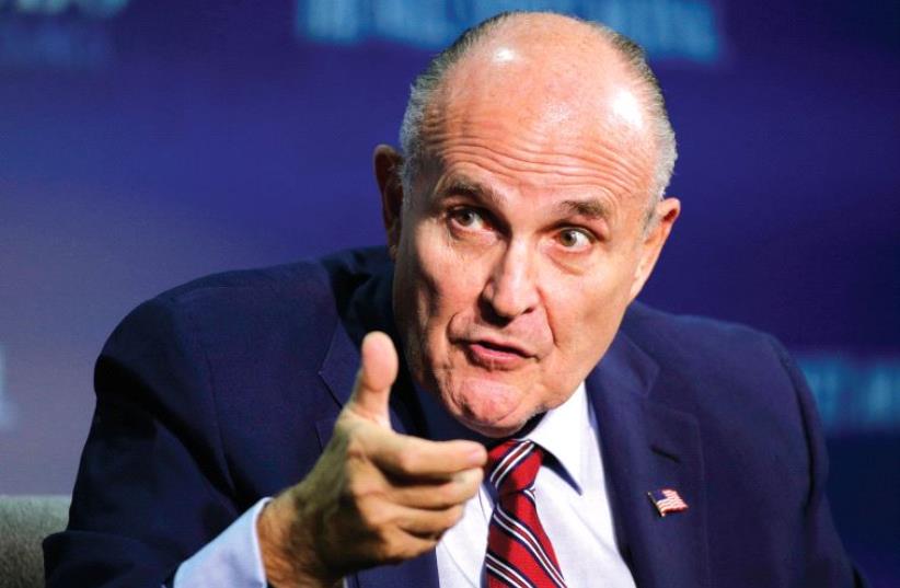 RUDY GIULIANI, vice chairman of the Trump Presidential Transition Team, speaks at the Wall Street Journal CEO Council in Washington. (photo credit: REUTERS)