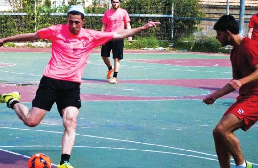 The yeshiva soccer league in Jerusalem is back in action, with players in different post-high school programs squaring off against each other for bragging rights (photo credit: COURTESY / JOSH ZNEIMER)