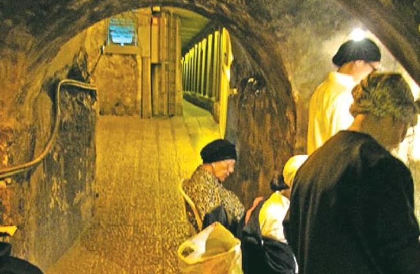 THE WESTERN WALL tunnels. ‘Recognizing these underground spaces as sacred only to the Jewish people has consequences for the archeology of the area and carries political implications.’ (photo credit: Wikimedia Commons)