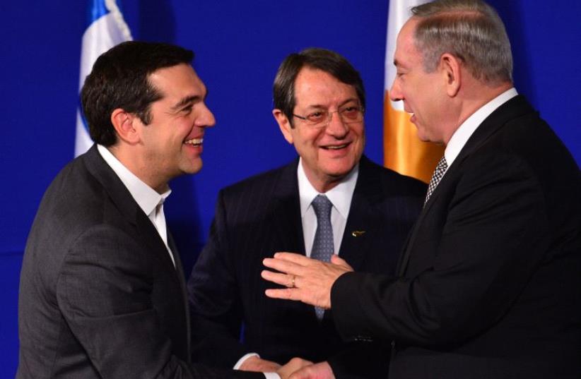 Israeli PM Netanyahu, Greek PM Tsipras and Cyprus President Anastasiades in a trilateral summit (photo credit: KOBY GIDEON/GPO)