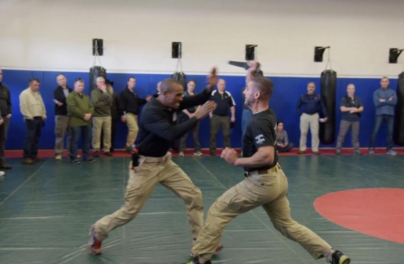 The delegation observes hand-to-hand combat drills at Jerusalem’s police academy (photo credit: POLICE SPOKESPERSON'S UNIT)