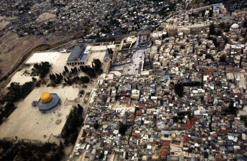A general view shows Jerusalem's old city from an Israeli Air Force plane during an aerial show as part of celebrations for Israel's Independence Day to mark the 66th anniversary of the creation of the state, May 6, 2014 (photo credit: REUTERS)