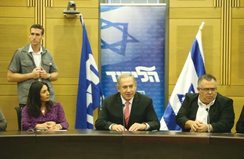Culture Minister Miri Regev, Prime Minister Netanyahu and MK David Bitan in the Knesset in November (photo credit: MARC ISRAEL SELLEM)