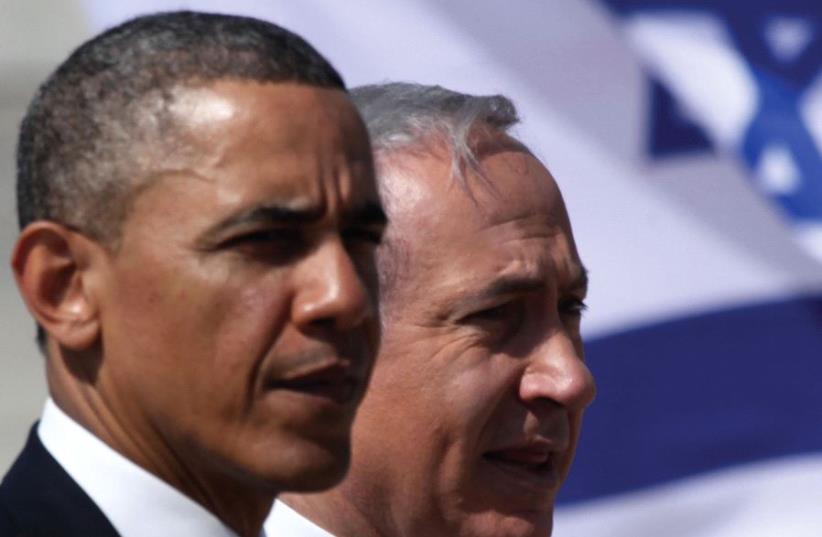 PRIME MINISTER Benjamin Netanyahu stands with President Barack Obama (photo credit: MARC ISRAEL SELLEM/THE JERUSALEM POST)
