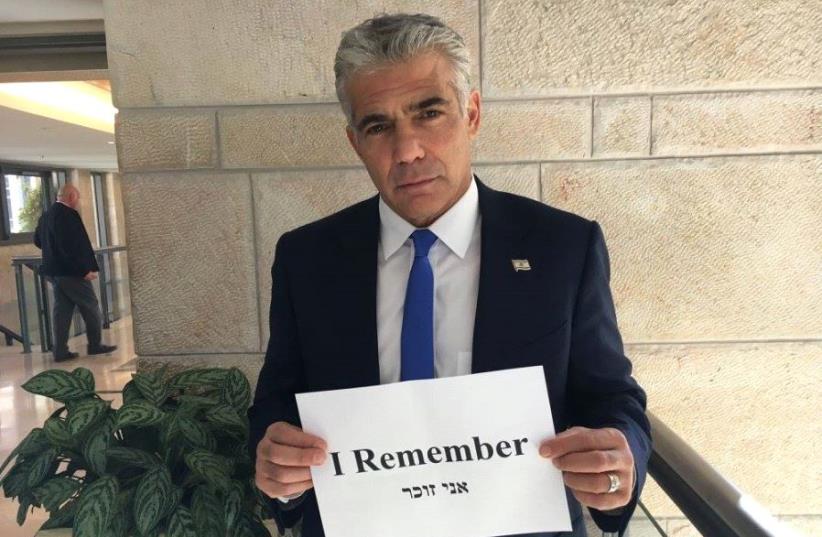 MK Yair Lapid (Yesh Atid) takes part in a World Jewish Congress photo project for Holocaust Remembrance Day. (photo credit: WORLD JEWISH CONGRESS)