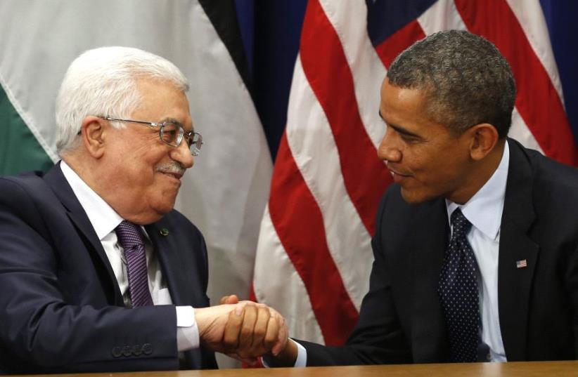 US President Barack Obama (R) meets with Palestinian Authority President Mahmoud Abbas during the United Nations General Assembly in New York September 24, 2013. (photo credit: REUTERS)