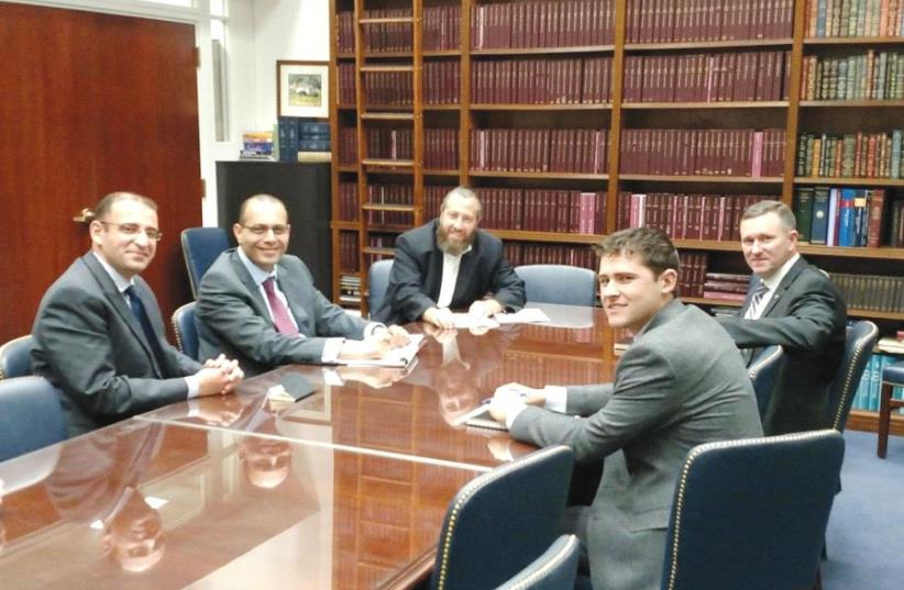 SEATED IN the office of Senator Orrin Hatch (R-UT) in Washington in 2016, from left: Egyptian Embassy officials Khaled El Menshawy and Muhammad Samir, Friedlander Group CEO Ezra Friedlander, and congressional staffers Doug Dynes and JC Cardinale (photo credit: THE FRIEDLANDER GROUP)