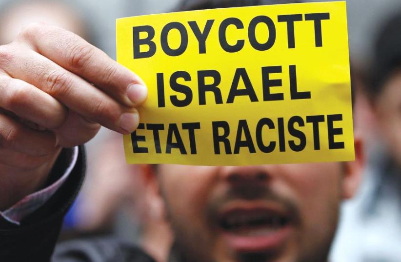 ‘INSTEAD OF fighting the Israeli army on the battlefield or killing civilians through acts of terrorism, the BDS movement seeks to destroy Israel’s image in the eyes of the world.’ (photo credit: REUTERS)