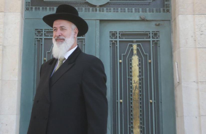 Former chief rabbi Yona Metzger leaves a Jerusalem court last March (photo credit: MARC ISRAEL SELLEM)