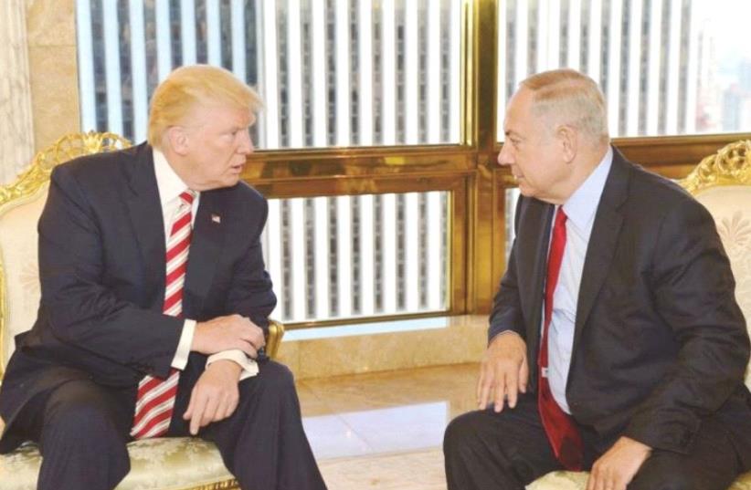 Donald Trump and Benjamin Netanyahu  (photo credit: KOBI GIDEON/GPO)
