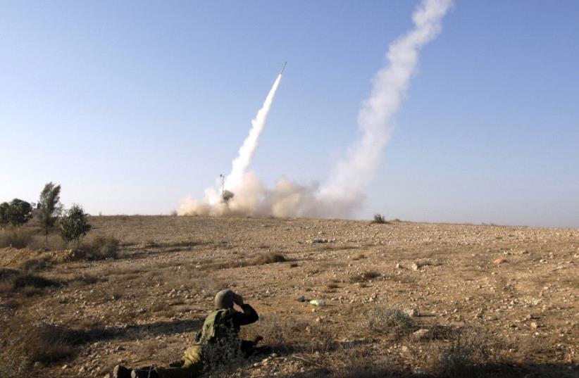 Iron Dome launcher fires an interceptor rocket  (photo credit: REUTERS)