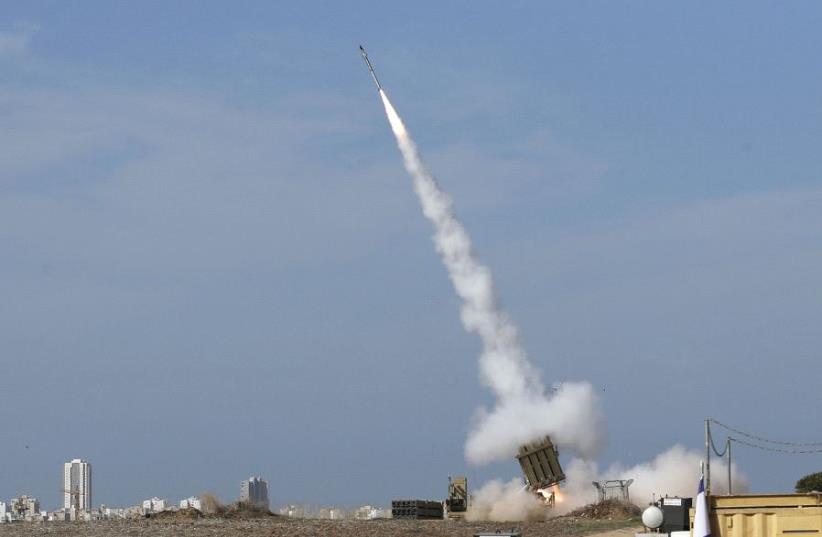 Iron Dome launcher fires an interceptor rocket  (photo credit: REUTERS)