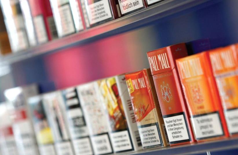 ‘THE TOBACCO industry attempts to impede tobacco regulation have changed over the years, but have not abated – they have instead mutated, and on a global scale.’ (photo credit: REUTERS)