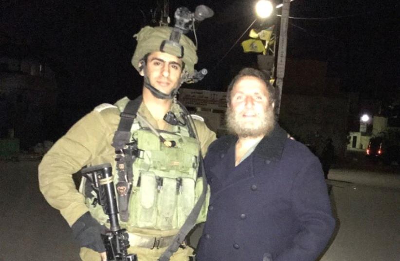 The author with an IDF soldier (photo credit: Courtesy)